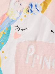 Blush pink cotton t-shirt with a white unicorn graphic, rainbow mane, and gold horn.