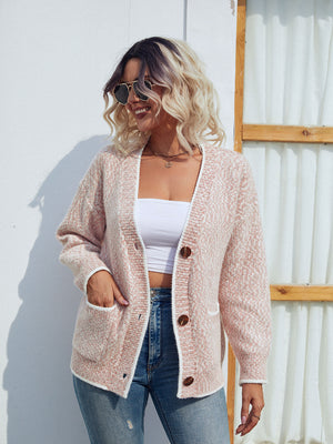 Blush pink textured knit cardigan with contrast trim, button front, and pockets.