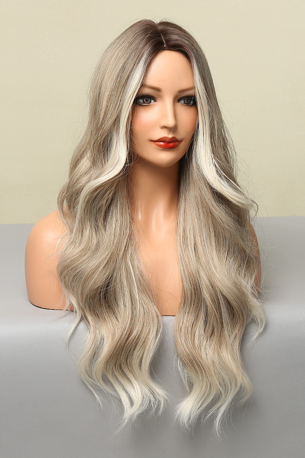 Ombre beach wave wig in light brown/blonde balayage with face-framing layers.