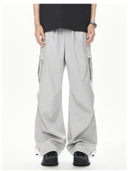 Men's light gray relaxed fit cargo sweatpants with adjustable drawstring cuffs and multiple pockets.