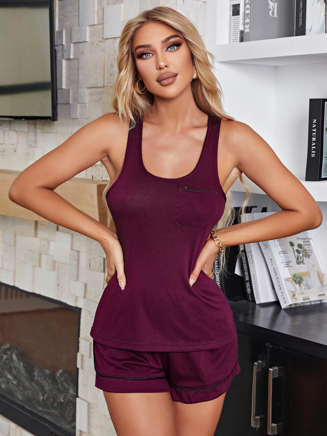 Burgundy loungewear set with contrast trim tank top and shorts.
