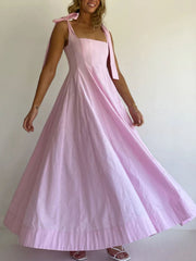 Pink maxi dress with square neckline and bow tie shoulder straps
