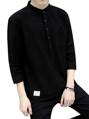 Black cotton relaxed-fit shirt with band collar, button detail, and chest pocket.
