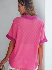 Pink waffle-knit button-down shirt with short sleeves and contrast collar and cuffs.