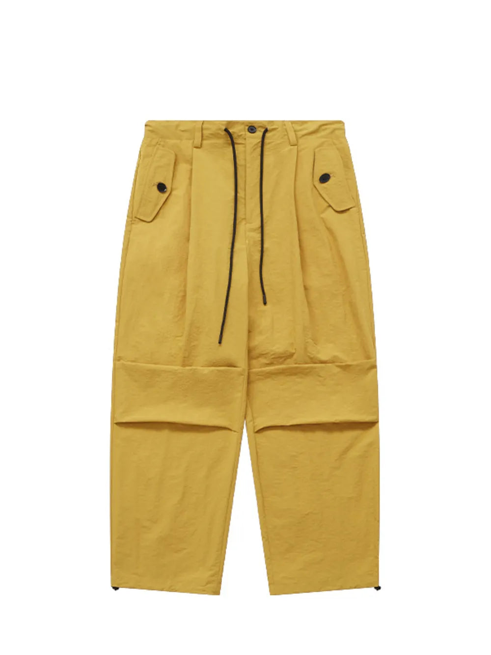 Ginger yellow cargo joggers with drawstring waist and button flap pockets.