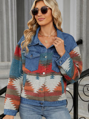 Southwestern denim trucker jacket in dusty blue with geometric pattern and button closure.