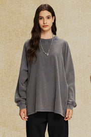 Raglan sleeve washed cotton sweatshirt in dark gray with crew neck and relaxed fit.