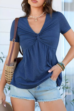 Blue polyester short-sleeve blouse with V-neck and twist knot detail