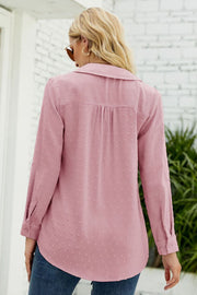 Textured collared blouse in dusty pink with long sleeves and a button cuff.