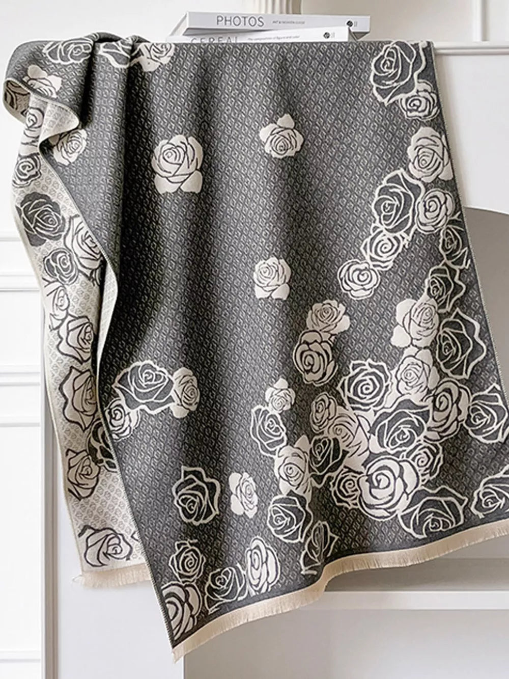 Gray scarf with an elegant floral rose pattern and diamond texture.