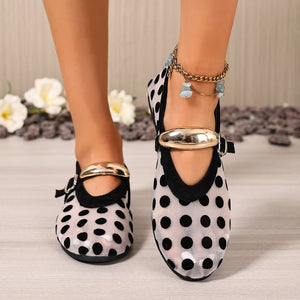 Chic polka dot mesh flats with gold buckle detail and ankle strap.