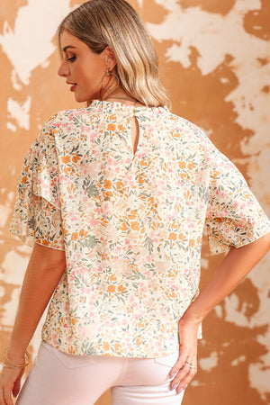 Floral ruffle trim blouse with keyhole back and short flutter sleeves.