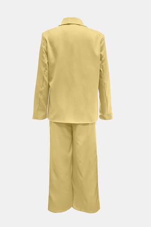 Pastel yellow pant suit with track stripes on the pants.