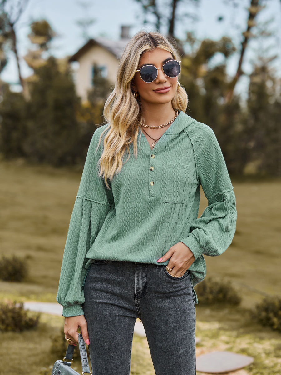 Textured knit henley in Gum Leaf with balloon sleeves and button detail