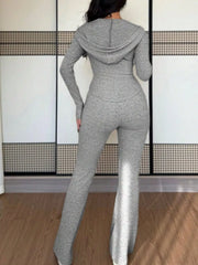 Light gray ribbed knit zip-up hooded set with flared pants.