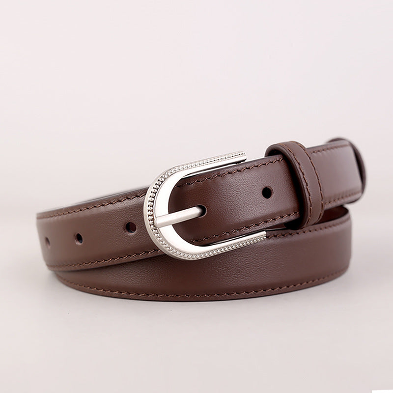 Brown leather belt with rhinestone buckle and silver hardware.