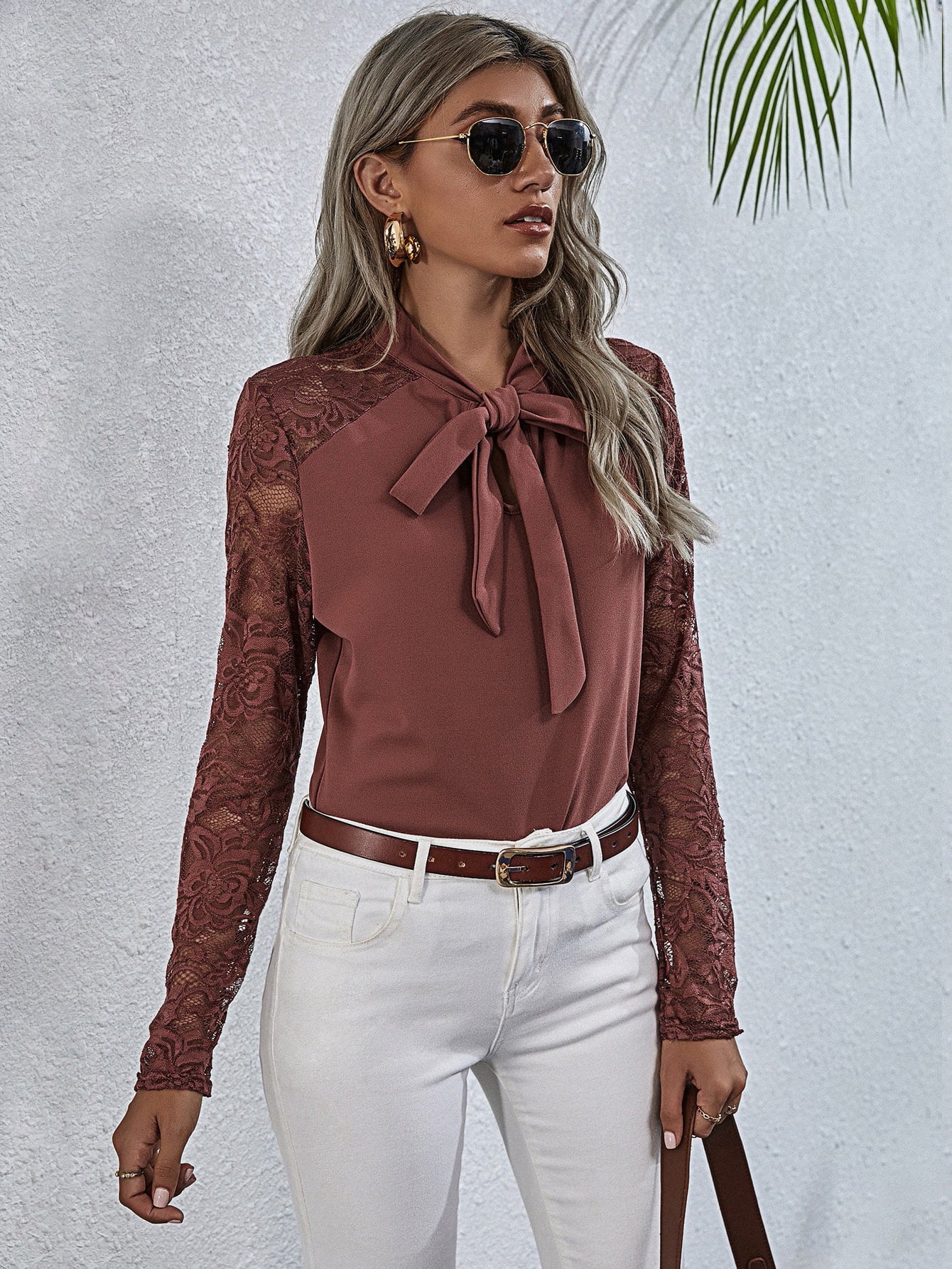 Light Mauve lace inset bow blouse with long lace sleeves and a tie neck.