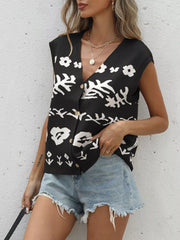 Black floral V-neck button-down cardigan vest with gold buttons.