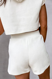 White textured crop hoodie and shorts set with geometric pattern