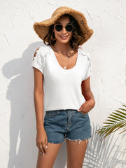 White t-shirt with lace shoulder detail and scoop neckline.