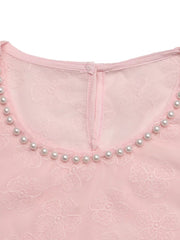 Pink embroidered floral blouse with pearl trim neckline and sheer overlay.