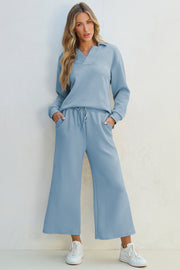 Light blue textured polo sweatshirt and wide-leg culottes set with drawstring waist