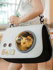 White pet carrier bag with bubble window and cute food decals.