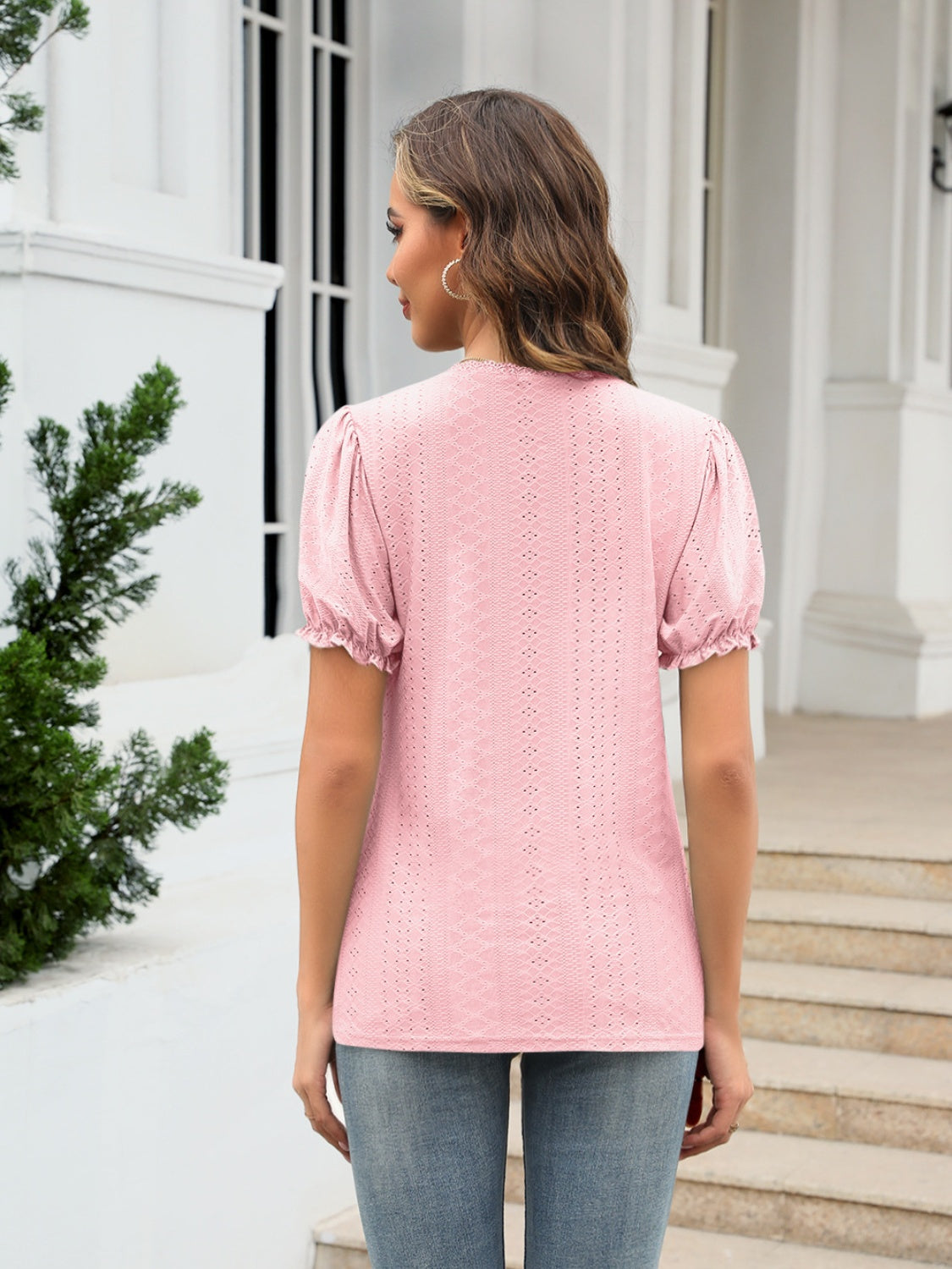 Blush pink eyelet puff sleeve v-neck blouse with textured pattern