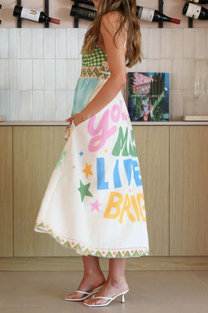 Gingham bodice midi dress with colorful "You Make Live Bright" graphic print and border detail.