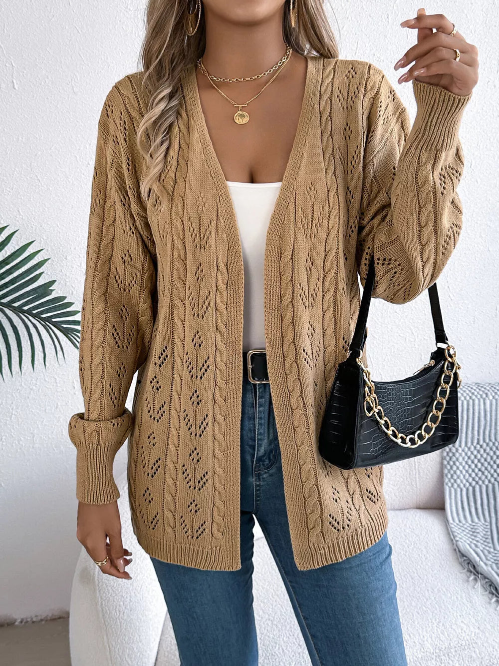 Khaki openwork cable knit long sleeve cardigan with a relaxed fit.