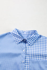 Light blue gingham oversized shirt with patch pocket and button front.