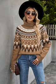 Geometric knit turtleneck sweater in camel with a fair isle pattern, ribbed cuffs and hem.