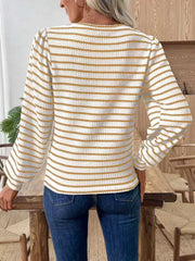 Textured knit long-sleeve t-shirt in white with gold stripes and a waffle knit texture.