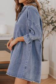 Light blue denim shirtdress with A-line cut and ruffled cuff detail