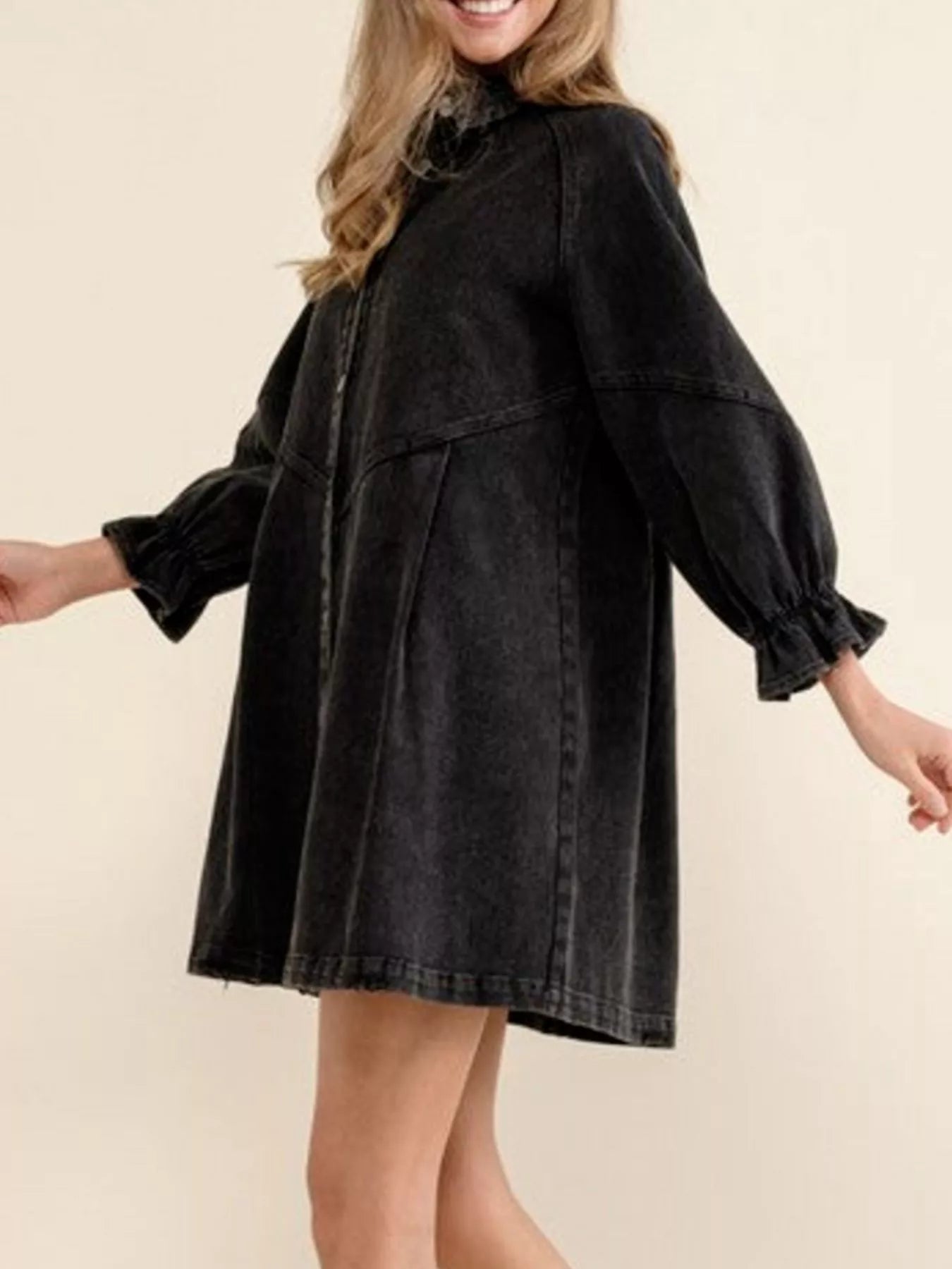 Black denim button-down dress with ruffled cuffs and balloon sleeves.