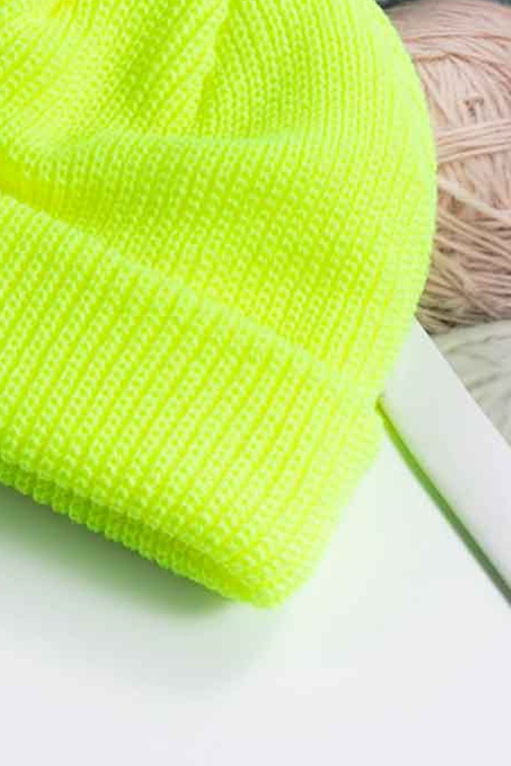 Ribbed knit beanie in bright yellow with a turn-up cuff