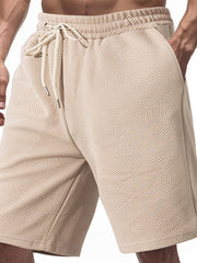 Men's relaxed fit chino shorts in Khaki with a geometric textured pattern and drawstring waist.
