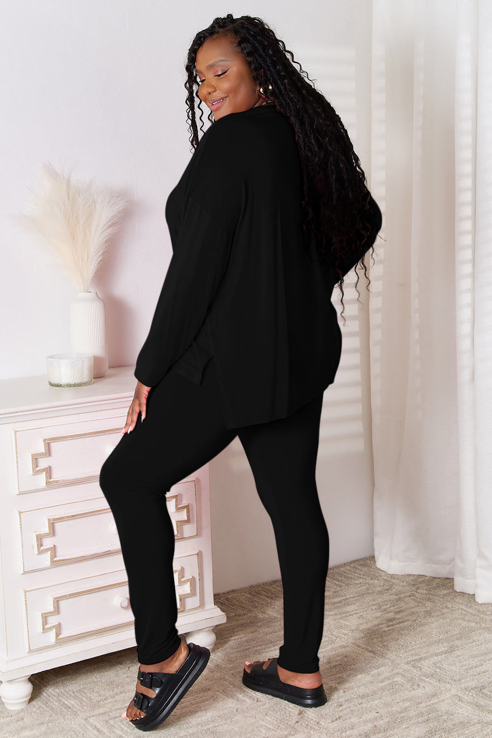 Black relaxed knit loungewear set with V-neck top and leggings, bamboo fabric