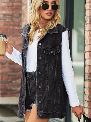 Longline black denim vest with utility pockets and collared neckline.