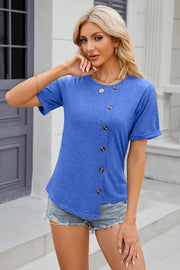 Blue asymmetric button-up tee with short sleeves and a rounded neckline.