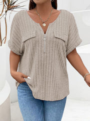 Khaki ribbed knit henley with short sleeves, zip neckline, and chest pockets.