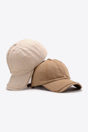 Raw edge denim baseball caps in Camel and Cream with distressed details.