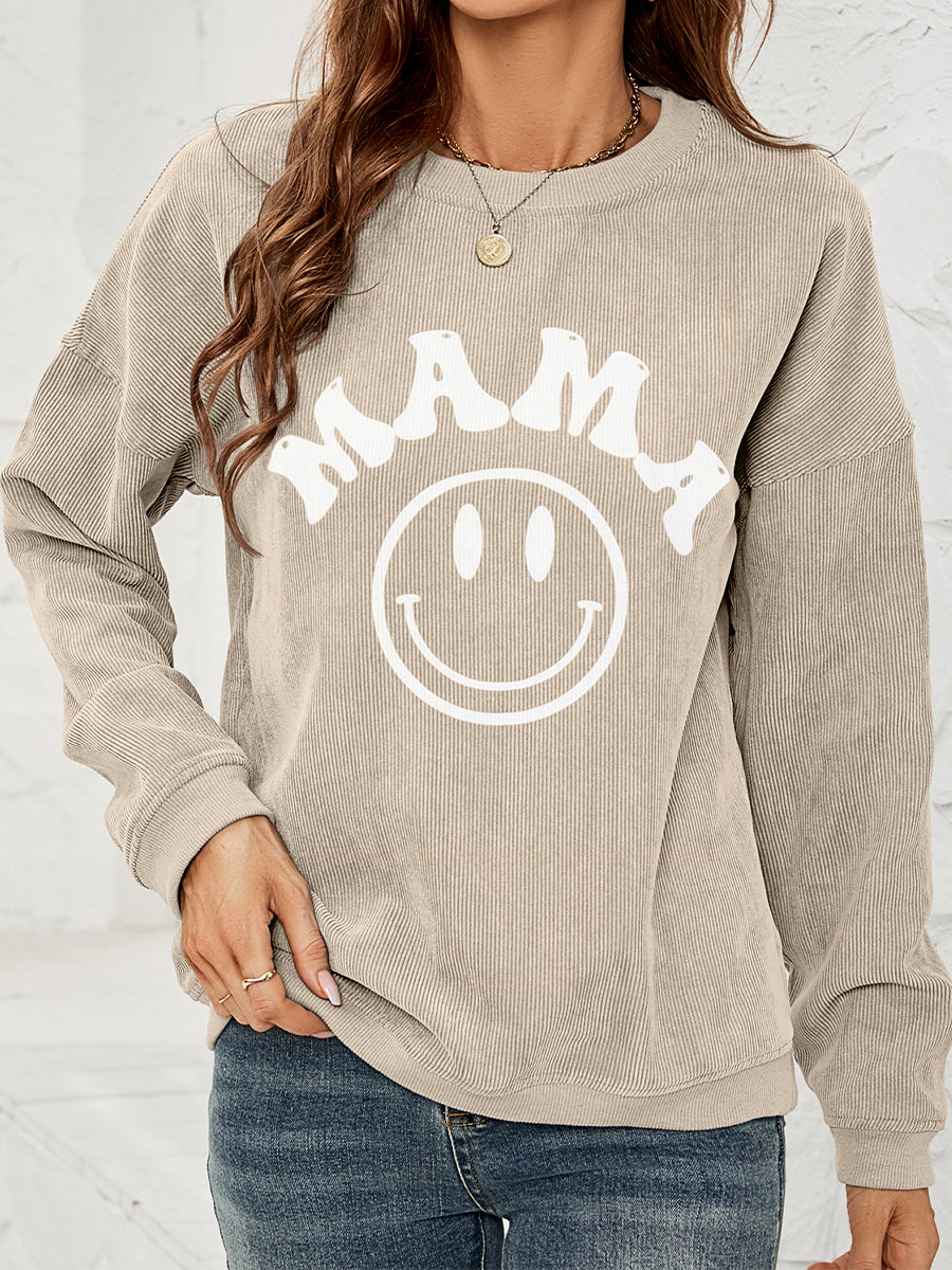 Sand corduroy sweatshirt with white "Mama" smiley graphic and crew neck.