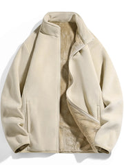 Fleece lined zip-up jacket in Apricot with stand collar and side pockets.