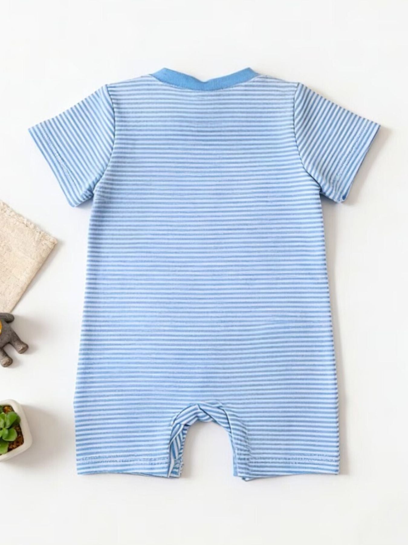 Blue and white striped baby bodysuit with short sleeves and a round neckline.
