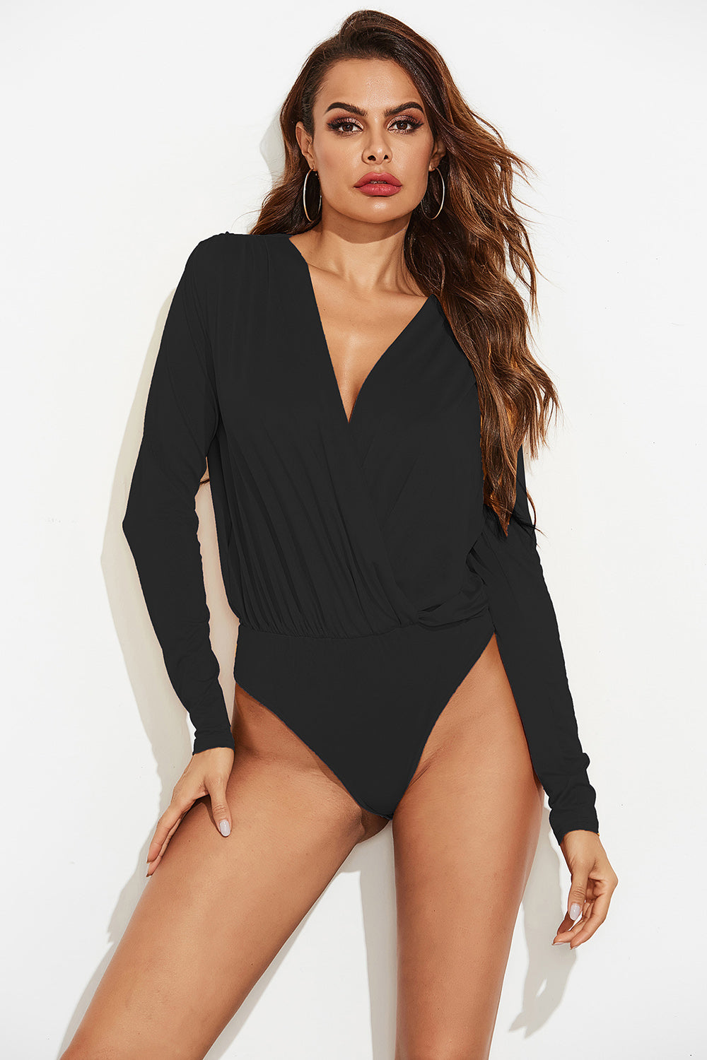 Black long sleeve bodysuit with plunging neckline and draped front.
