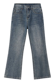 Baggy denim jeans in medium wash with subtle fading and a relaxed fit.