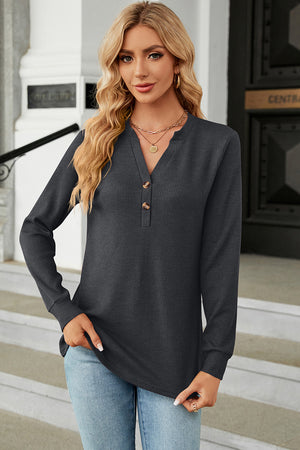 Dark Gray waffle knit henley shirt with button placket and long sleeves.