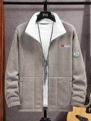 Men's grey fleece zip-up jacket with white collar and embroidered details.