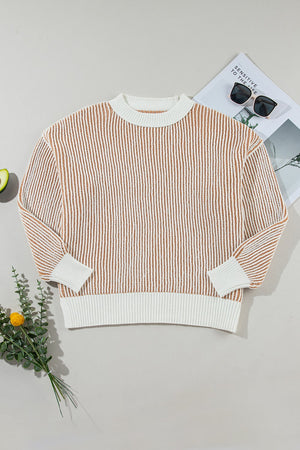 Camel and white vertical stripe drop-shoulder knit sweater with crew neck and ribbed cuffs and hem.